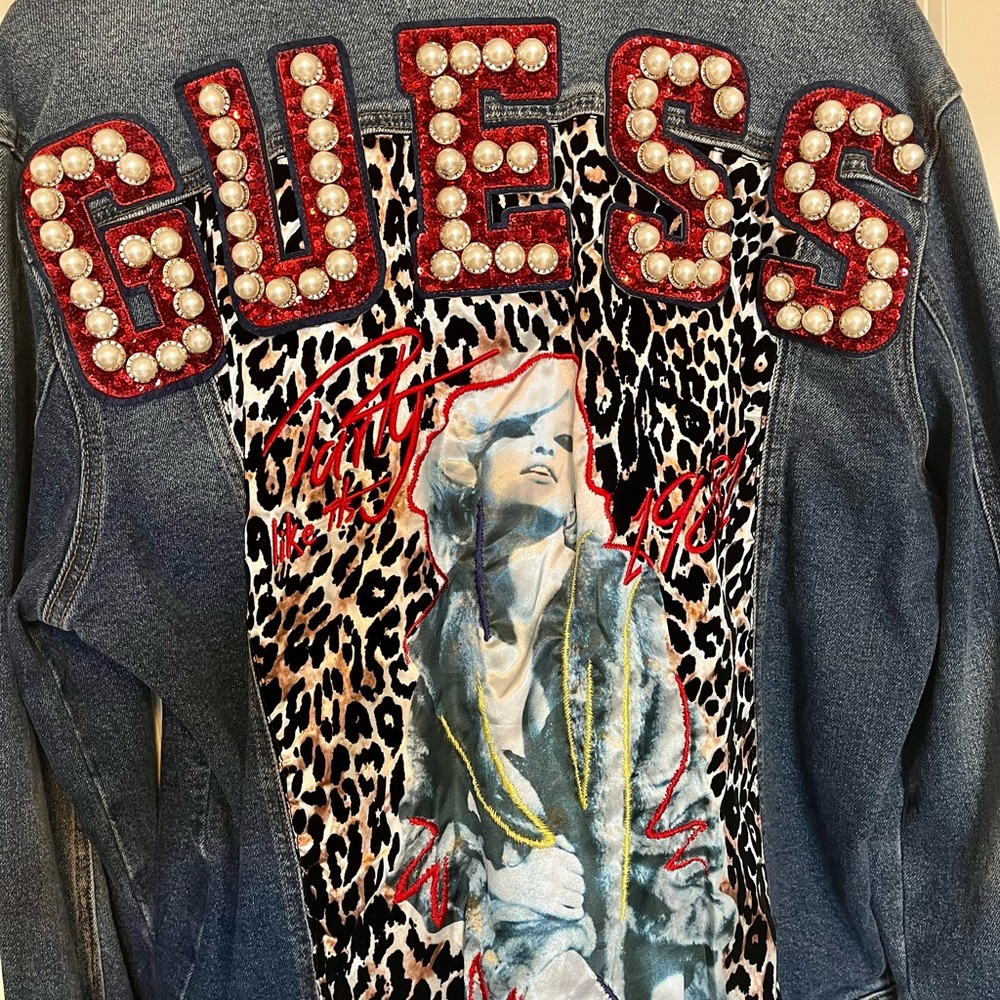 Guess designer denim jacket. Very unique piece!